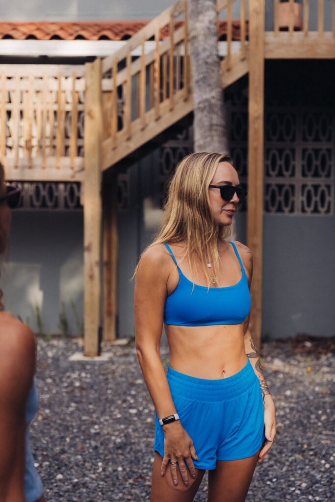 Me in a CRZ Yoga sports bra and running shorts in El Zonte
