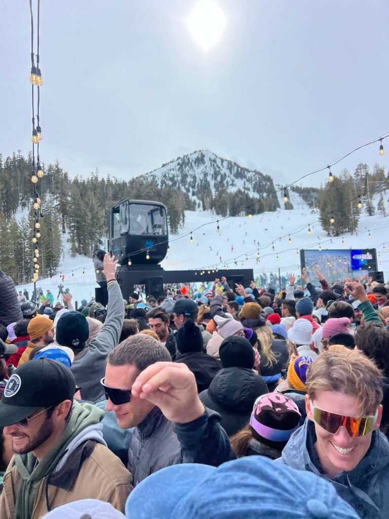 Big crowd at a Mammoth event with the mountain behind