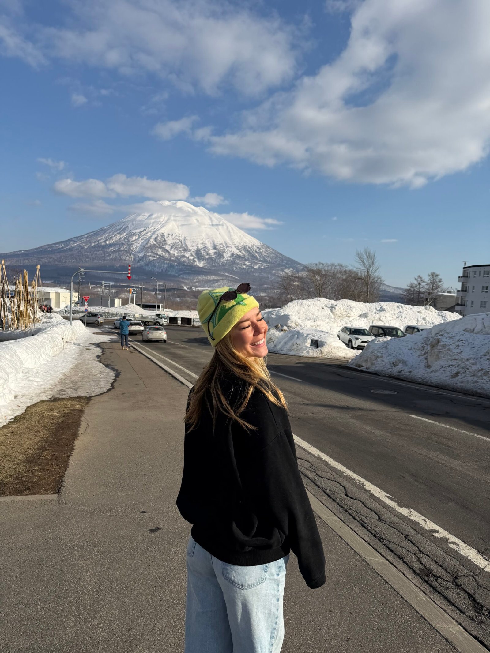 Mt. Yotei behind a snowy road in Niseko