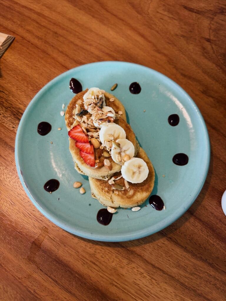 Pancakes with fruit for breakfast in El Zonte