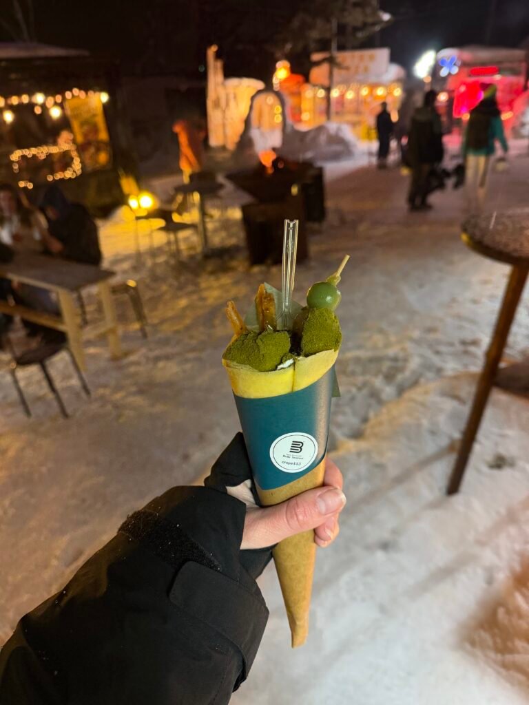Food truck dessert at night in snowy Hirafu