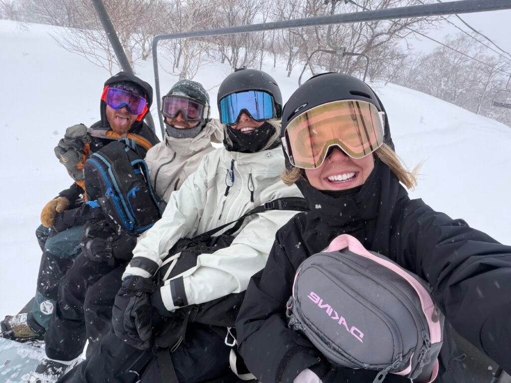 College friends packed into a gondola in Niseko