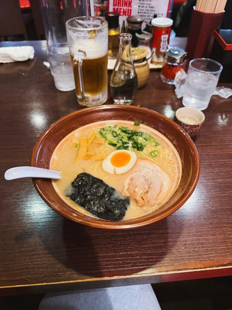 Bowl of ramen and a beer