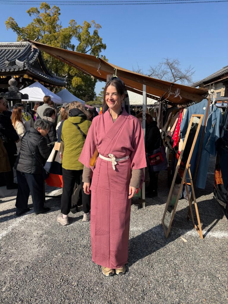 Katie in a pink kimono at the Kyoto temple market