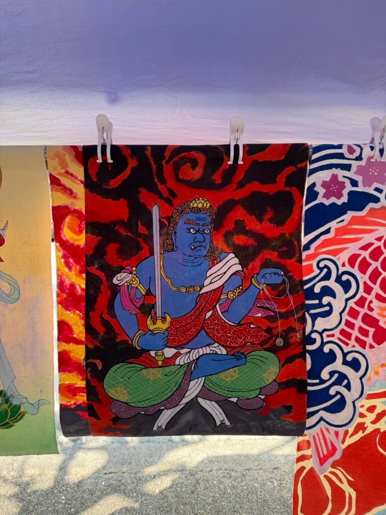 Hand-painted art for sale at the temple market