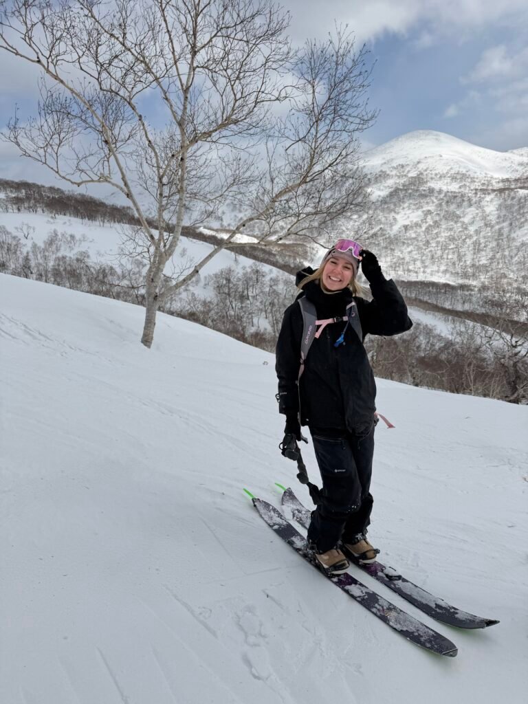 Skier on a snowy slope on the backcountry day