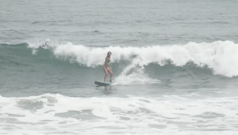 Surfing a wave in El Zonte, El Salvador