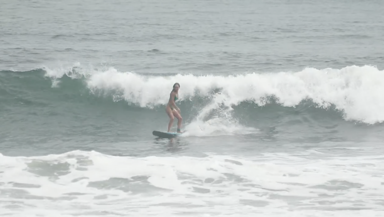 Surfing a wave in El Zonte, El Salvador