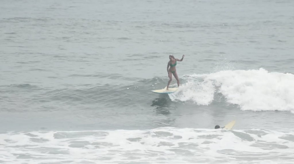 Riding a wave at the break in El Zonte